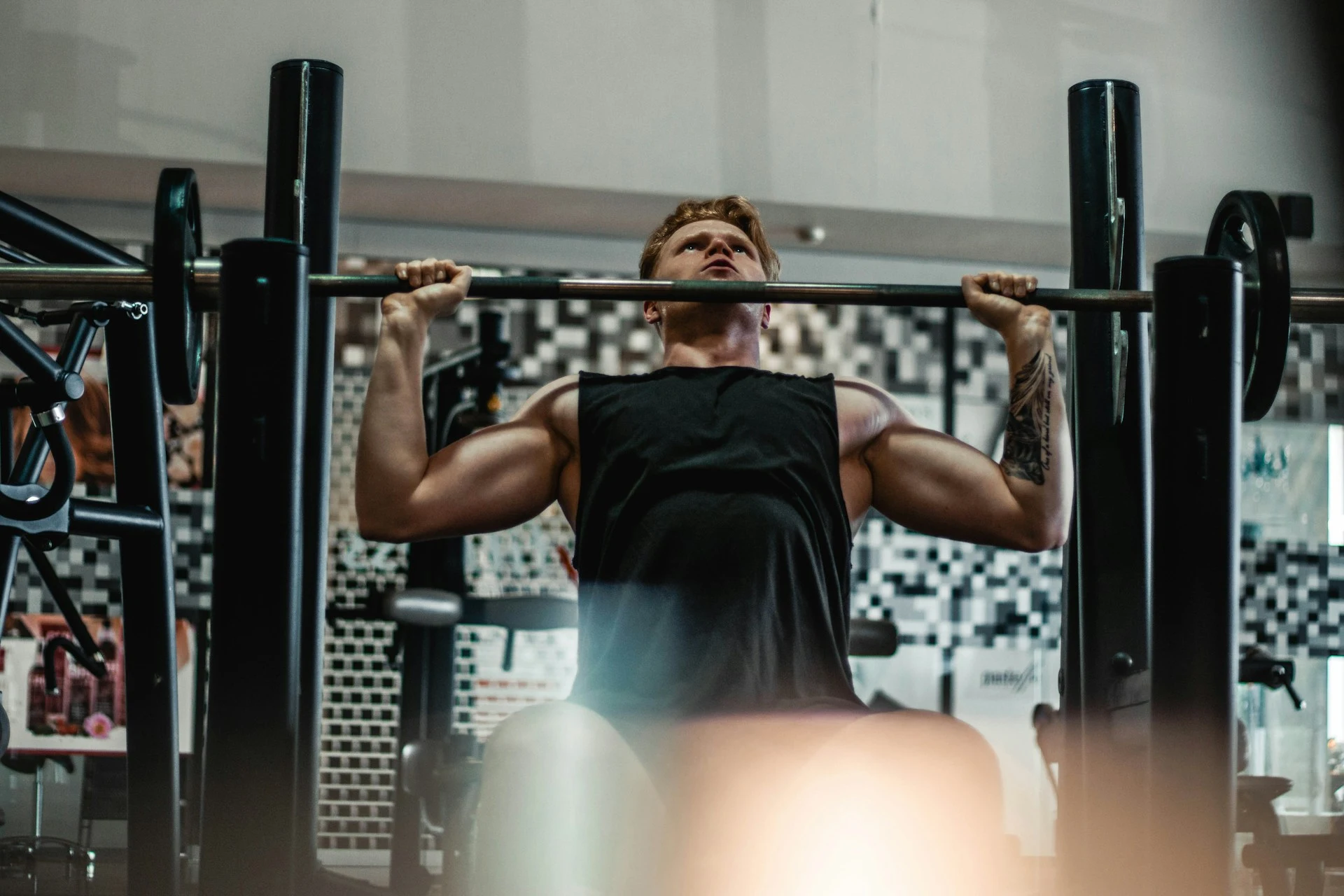 Man working out in a gym during testosterone therapy
