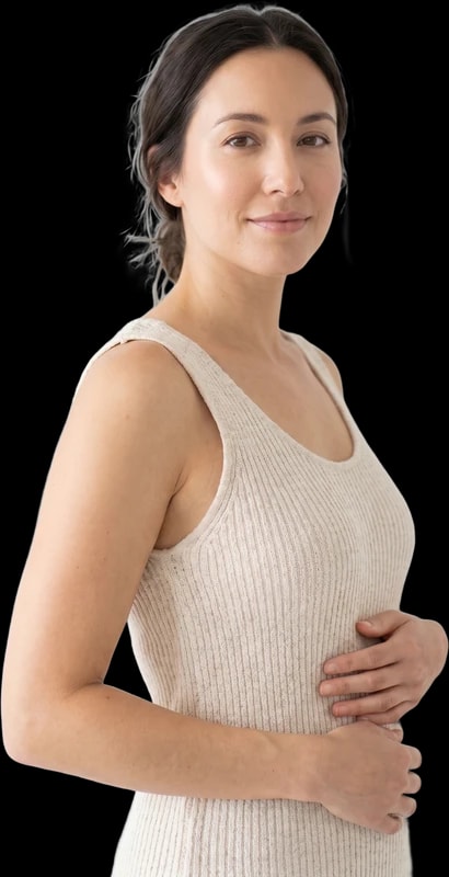Woman resting her hands on her stomach