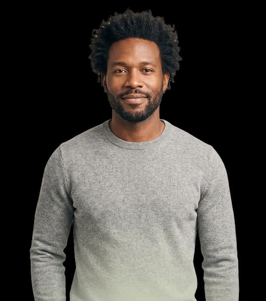 Smiling man representing sustained wellness after completing an Ivologist program