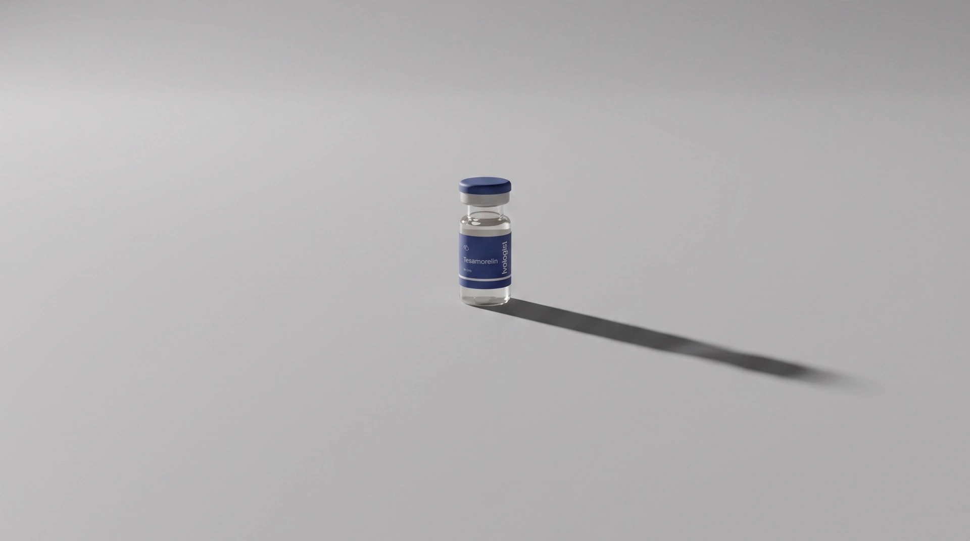 A tesamorelin vial with a blue label on a pale grey surface